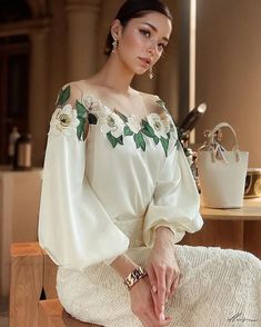 Long Sleeve Embroidered Top For Spring Wedding, Elegant Long Sleeve Embroidered Top With Floral Embroidery, Elegant Tops With Intricate Embroidery For Spring, Elegant Spring Blouse With Floral Embroidery, White Long Sleeve Blouse With Floral Applique, Elegant Long Sleeve Tops With Floral Applique, Chic Formal Tops With Floral Embroidery, Elegant Long Sleeve Embroidered Top For Spring, Spring Wedding Embroidered Blouse