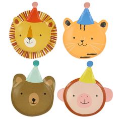 three animal shaped plates with hats on them