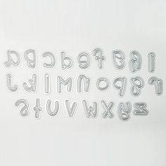 the letters and numbers are cut out of plastic