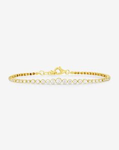 14k solid gold 33 graduated round, natural diamonds: 3/4 diamond coverage Total carat weight: approximately 0.83 Color: G-H Clarity: SI Bezel-set diamond widths: 1.6 mm-3.7 mm Length: 6.5-7 and 7-7.5 inches, adjustable Lobster clasp closure Tennis Jewelry, Bezel Jewelry, Ring Concierge, Necklace Length Guide, Bracelet Size Chart, Silver Bracelets For Women, Kids Rings, Gold Rings Jewelry, Kids Bracelets