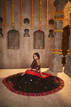 Shubhkala Black Designer Mirror Work with Embroidered Chaniya choli for Navratri Festival Celebrate the Navratri festival in style with the Shubhkala Black Designer Mirror Work with Embroidered Chaniya Choli. This stunning outfit features intricate mirror work and embroidery, adding a touch of elegance and tradition to your festive look. Crafted with attention to detail, this chaniya choli is perfect for those who want to stand out during the celebrations. Key Features Elegant black chaniya choli set designed for Navratri celebrations. Intricate mirror work and embroidery for a traditional look. High-quality fabric for comfort and durability. Available in various sizes to fit different body types. Specifications Color: Black Pattern: Mirror Work and Embroidery Occasion: Navratri Festival F Semi-stitched Lehenga With Resham Embroidery For Festival, Festive Georgette Choli For Navratri, Black Traditional Wear With Dupatta For Navratri, Navratri Chandbali Shape Georgette Choli, Art Silk Traditional Wear For Navratri, Black Sharara For Festive Navratri, Black Sharara For Festive Navratri Occasions, Bollywood Saree Choli For Navratri, Art Silk Choli For Navratri