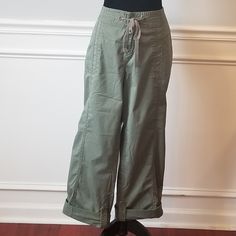 These Are Great Avenue Capris. Avenue Clothing Is Well Made And Items That Will Last For A Long Time In Your Wardrobe. These Are Timeless Capris, That Never Go Out Of Style. Great Green Color, Awesome Stitching Throughout The Pants, Pockets On Side & Back And Drawstring. 98% Cotton, 2% Spandex With A Little Give. Inseam 24 Inches, Waist 19 Inches Flat. Please Reach Out With Any Questions You May Have. Great Posh Find. Have Been Laundered. ! Casual Khaki Cargo Pants With Button Closure, Spring Utility Bottoms With Buttons, Casual Wide Leg Cargo Pants With Button Closure, Spring Military Style Cotton Pants, Spring Cotton Military Pants, Military Style Relaxed Fit Pants For Spring, Military Style Cotton Cargo Pants For Spring, Military Cotton Cargo Pants For Spring, Casual Cargo Pants With Button Closure