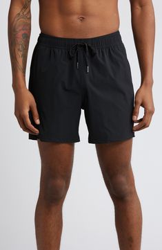 Quick-drying swim trunks feature a built-in liner and natural odor resistance, plus pockets that drain so your swims won't get bogged down. 5" inseam; 24" front rise; 11" front rise; 14" back rise (size Medium) Elastic/drawstring waist Side-seam pockets; back zip pocket Water-repellent Lined 88% recycled nylon, 12% spandex Machine wash, tumble dry Imported Black Swim Trunks With Liner For Outdoor, Functional Solid Swim Trunks With Built-in Shorts, Moisture-wicking 4-way Stretch Swim Trunks For Training, Training Swim Trunks With 4-way Stretch And Moisture-wicking, Black Short Swim Trunks For Water Sports, Black Short Swim Trunks For Swimwear, Functional Short Swim Trunks With Elastic Waistband, Functional Short-length Swim Trunks With Elastic Waistband, Functional Go-dry Swim Trunks For Training