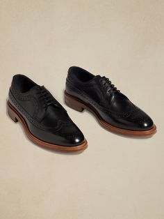 Our traditional long-wing blucher cut from supple Italian calf-skin leather.  This pair is outfitted with an antique storm welt, mounted on a rubber sole.  Details include intricate broguing, a medallion toe, and an iconic silhouette that have remain Timeless Brogue Oxford Shoes For Derby, Timeless Wingtip Oxford With Goodyear Welt, Timeless Goodyear Welted Wingtip Oxford, Timeless Leather Lace-up Shoes With Brogue Detailing, Timeless Wingtip Oxford For Derby, Timeless Wingtip Oxford Shoes For Derby, Timeless Oxford With Leather Sole For Derby, Timeless Oxford Shoes With Leather Sole For Derby, Classic Brogue Oxfords For Derby