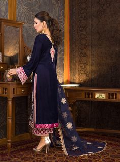 Buy Velvet Salwar Kameez Designs, Pakistani Dress, in Premium Quality Details with Embellishments paired with Capri/Salwar. Customizable. Fast Shipping Elegant Jamawar Lawn Suit For Festivals, Elegant Jamawar Salwar Kameez For Festivals, Traditional Jamawar Dress With Mirror Work, Elegant Jamawar Dresses With Zari Work, Elegant Eid Lawn Suit In Jamawar, Raw Silk Long Sleeve Party Dress, Long Sleeve Raw Silk Party Dress, Elegant Semi-stitched Jamawar Lawn Suit, Elegant Designer Jamawar Salwar Kameez