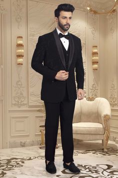 This TUXEDO- R14-S63 showcases stunning black cutdana embroidery, adding a touch of elegance and sophistication to your ensemble. Expertly crafted with precision and attention to detail, this tuxedo is the perfect choice for any formal occasion. Its intricate design is sure to make you stand out in the crowd. Luxury Fitted Sherwani For Semi-formal Occasions, Elegant Tuxedo For Black-tie Festive Events, Luxury Fitted Suit For Festive Season, Elegant Tuxedo For Gala And Festive Occasions, Fitted Blazer For Black-tie Festive Events, Luxury Festive Tuxedo For Gala, Tailored Tuxedo Sets For Gala, Elegant Festive Suits For Gala, Elegant Gala Suits For Festive Occasions