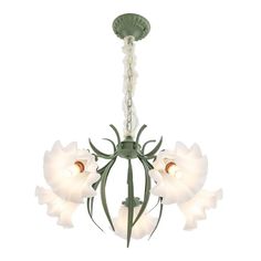 a chandelier with five white flowers hanging from it's center and four lights on each side