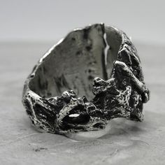 Brutalist Open Ring With Oxidized Finish, Brutalist Oxidized Open Ring Jewelry, Artistic Metal Open Ring, Modernist Oxidized Silver Ring, Modernist Silver Ring With Oxidized Finish, Unique Oxidized Open Engraved Ring, Artistic Open Ring In Metal, Hand Cast Silver Open Ring, Silver Hand Cast Open Ring