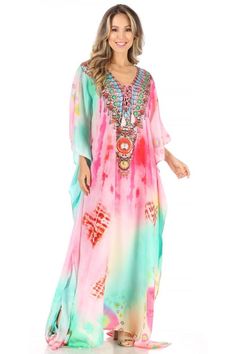 This caftan dress cover up is made of a lightweight material with no structure so that it drapes effortlessly and elegantly. It is very forgiving and loose fitting for maximum comfort and best wear. Colors are very vibrant and unique. Each dress is handmade and timeless. Multicolor Flowy V-neck Kaftan, Multicolor Split Neck Dress For Vacation, Multicolor Split Neck Vacation Dress, Multicolor Bohemian Dress With Split Neck, Bohemian Multicolor Split Neck Dress, Spring V-neck Free Size Kaftan, Flowy Multicolor V-neck Kaftan, Multicolor Flowy V-neck Cover-up, Multicolor Kaftan For Spring Beach Cover-up