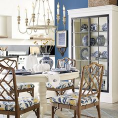 a dining room with blue and white decor