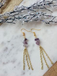 Beautiful Amethyst drop earrings Amethyst is primarily associated with physical elements of the nervous system.  The curing of nightmares and insomnia. Gold Amethyst Drop Earrings, Gold Amethyst Dainty Earrings, Gold Dangle Earrings With Birthstone, Dainty Gold Amethyst Earrings, Purple Crystal Earrings With Ear Wire As Gift, Purple Crystal Earrings For Gift, Nickel-free Purple Chandelier Earrings Gift, Gold Spiritual Drop Crystal Earrings, Gold Gemstone Crystal Earrings As Gift