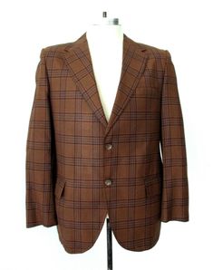 Cool vintage 1960's dark golden brown and blue plaid blazer from Lowell House. Lightweight, nicely soft, feels like great quality worsted wool. Features - two button front - center vent APPROXIMATE MEASUREMENTS in inches - lying flat Size:  Unknown, likely 40 Short Shoulder to shoulder:  17 Sleeve, from shoulder:  23 Chest, armpit to armpit:  21 Waist:  20 Length, center back:  29 CONDITION Vintage blazers have often been altered so exact sizing can be tricky... please double check measurements. Vintage Single Breasted Tweed Jacket For Tailoring, Tailored Vintage Tweed Jacket, Retro Single Breasted Tweed Jacket, Vintage Single-breasted Tweed Jacket For Tailoring, Retro Single-breasted Tweed Jacket, Vintage Single-breasted Wool Blazer, Vintage Tailored Sport Coat With Welt Pockets, Vintage Sport Coat With Welt Pockets For Work, Vintage Brown Tweed Jacket