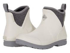 The Original Muck Boot Company Muck Originals Ankle - Women's Shoes : White/Grey Wool : Crafted with style and comfort The Original Muck Boot Company Muck Originals Ankle booties feature a man-made upper, lining, insole, and outsole, a pull-on construction, and a round-toe silhouette. Imported. Measurements: Weight: 1 lb 6 oz Circumference: 11 in Shaft: 6 in Product measurements were taken using size 7, width M. Please note that measurements may vary by size. Weight of footwear is based on a sin White Rain Boots For Winter Outdoor Use, White Winter Rain Boots For Outdoor, Womens Muck Boots, Boot Companies, Muck Boots, Boots Women, Shoes White, Product Reviews, Ankle Booties