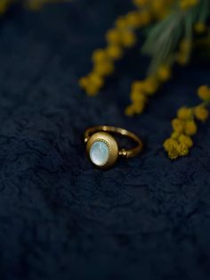 the natural mother of pearl cabochon at it's best🤍 simple and elegant.  Materials: 18k gold vermeil with natural mother of pearl  Dimension: 0.5 inch front height 0.25 front width Elegant Gold Opal Cabochon Ring, Elegant Gold Rings With Mother Of Pearl, Elegant Oval Mother Of Pearl Ring, Elegant Opal Oval Cabochon Ring Gift, Elegant Opal Ring With Oval Cabochon, Elegant Oval Cabochon Opal Ring Gift, Classic Mother Of Pearl Ring As A Gift, Classic Mother Of Pearl Ring As Gift, Classic Mother Of Pearl Ring For Gift