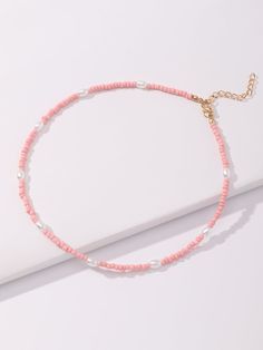 Color: Pink Gender: Women Material: Glass Quantity: 1 piece Style: Fashionable Details: Beaded, Pearls Type: Beaded Magnetic: No IN Length 15.7-17.6 This data was obtained from manually measuring the product, it may be off by 1-2 CM. Trendy Summer Spacer Beads, Pearl Beaded Necklaces With Spacer Beads For Beach, Beach Pearl Beaded Necklaces With Spacer Beads, Casual Summer Beaded Necklaces With Spacer Beads, Pearl Beaded Necklaces For Beach Outings, Beaded Pearl Jewelry For Summer, Summer Pearl Beaded Jewelry, Adjustable Pearl Beaded Necklaces For Beach, Beaded Necklaces With Letter Beads For Beach