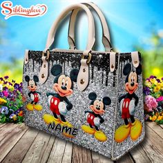 Custom Name Happy Mickey Mouse Leather Bag Introducing our Women’s Handbag, the epitome of sophistication and versatility. Crafted with premium materials and exquisite attention to detail, it offers both style and functionality. With spacious compartments and elegant design, our handbag seamlessly transitions from day to night, adding a chic touch to any outfit. Elevate your... Cartoon Women, Beach Canvas Wall Art, Women's Handbag, Beach Canvas, Jack Skellington, Black Stainless Steel, Black Handbags, Playful Design, Tops For Leggings