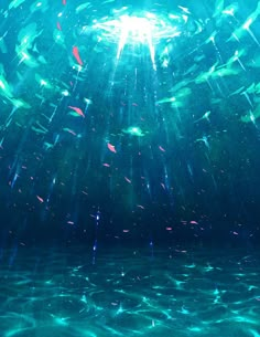 an underwater scene with fish swimming in the water and sunlight shining down on it's surface