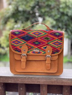 High quality colorful leather embroidered crossbody bag. This is a one of a kind purse that complements any outfit. Wear it for daily use or dress it up. Length: 10 3/4 inches Width: 3 inches Height: 9 inches Strap: Adjustable Visit us at Omxboutique on Instagram Multicolor Leather Backpack With Adjustable Strap, Multicolor Hand Tooled Travel Bags, Multicolor Embroidered Shoulder Bag With Adjustable Strap For Everyday, Everyday Rectangular Satchel With Multicolor Embroidery, Everyday Multicolor Embroidered Rectangular Satchel, Multicolor Leather Satchel As Gift, Multicolor Leather Satchel Gift, Multicolor Leather Satchel For Gift, Hand-stitched Multicolor Leather Bags