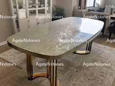 a table that has names on it in front of a living room with couches and chairs