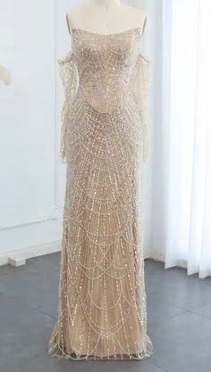 Discover more like this in the app Beaded Pearl Dress, Hand Beaded Dress, Jewelry For Off The Shoulder Dress, Roaring 20s Prom Dresses, Great Gatsby Prom Dress, Pearl Dress Design, Gold Ball Dress, Pearl Prom Dress, Beaded White Dress