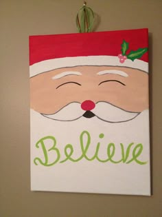 a christmas card with santa claus's face and the words believe written on it