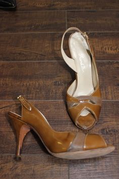 "Brown patent leather and brown suede slingbacks TAG/LABEL:  Frank Moore, 5.5N APPROXIMATE MEASUREMENTS: Toe to Heel       9\" Width      2.5\" Heel Height     3.5 \" CONDITION:  One scuff mark on front tip of left shoe.  Expected wear on bottom of sole from being worn." Brown Patent Leather Open Toe Heels, Brown Round Toe Medium Width Slingback Sandals, Brown Pointed Toe Slingback Pumps, Brown Slingback Sandals With Medium Width And Round Toe, Fitted Brown Slingback Pumps With Pointed Toe, Brown Round Toe Slingback Pumps, Brown Slingback Pumps With 4-inch Heel For Party, Brown Patent Leather Round Toe Sandals, Brown Patent Leather Sandals With Round Toe