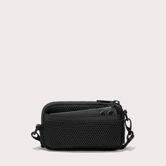 Breathable. Cushiony. Durable. Our lightweight crossbody bag for travel has you covered. Designed for daily adventures and travel too, this black Air Mesh sling bag keeps essentials within reach without weighing you down. Drape it across your chest, on your shoulder, or around your neck for the ultimate way to float through your day. Features interior and exterior pockets, an elastic loop, card slots, and a secure zipper closure, it keeps your stuff safe and organized anywhere. Durable Nylon Bags For Everyday Carry, Functional Crossbody Camera Bag With Cell Phone Pocket, Versatile Black Portable Chest Bag, Functional Zipper Pouch Travel Accessories, Versatile Portable Black Chest Bag, Functional Travel Accessories Zipper Pouch, Functional Travel Accessories With Zipper Pouch, Durable Rectangular Shoulder Bag For Travel, Functional Travel Shoulder Bag With Zipper