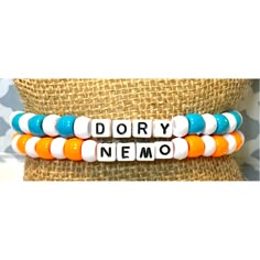 Set Of 2 Dory And Nemo Bead Friendship Bracelet Osfm Nwt Features: 1 Bead Bracelet That Says Dory With White & Blue Plastic Beads *1 Bead Bracelet That Says Nemo With Orange & White Plastic Beads *One Size Fits Most *Handmade By My Daughter To Make Extra Money *New Bundle & Save... Reasonable Offers Welcome! Check Out Our Other Handmade Bracelets And More Animal Bead Bracelets, Thing One And Thing Two Bracelets, Thing 1 Thing 2 Bracelets, Best Friends Beaded Bracelets, Beaded Bff Bracelets, The Office Bracelets, Clay Beads Friendship Bracelet Ideas, New Year Bracelet Ideas, Bsf Clay Bead Bracelets