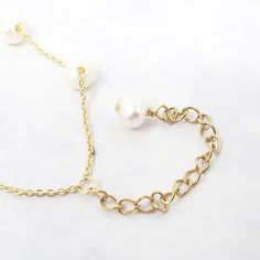 Our Freshwater Pearl Double Chain Wedding Bracelet, crafted with 18ct gold-plated copper and adorned with freshwater pearls, is the perfect elegant gift for brides, bridesmaids, or any special occasion.  Elevate your bridal ensemble with our Freshwater Pearl Double Chain Wedding Bracelet, an exquisite accessory perfect for bridesmaids or brides on their special day.   This jewellery arrives beautifully packaged and ready to gift. It would make a really thoughtful and meaningful birthday gift, Ch Delicate Baroque Pearl Bracelet With Pearl Chain, Delicate Baroque Pearl Chain Bracelet, Delicate Baroque Pearl Bracelet, Elegant Gold Bracelet With Baroque Pearl, Luxury Gold Pearl Necklace For Wedding, Gold Oyster Bracelet Jewelry For Wedding, Pearl White Bracelets With Pearl Pendant For Weddings, Elegant Gold Pearl Bracelet With Pendant, Gold Pearl Bridal Necklace With Delicate Chain