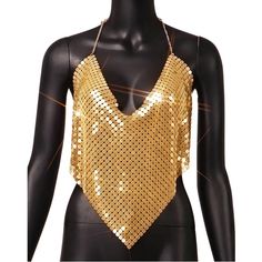 Metal halter top. Glamorous Club Tank Top With Halter Neck, Glamorous Halter Neck Tank Top For Club, Chic Triangle Halter Top For Club, Glamorous Triangle Halter Top For Parties, Gold Backless Halter Top For Summer, Glamorous Triangle Halter Top, Glamorous Gold Halter Top For Summer, Chic Gold Halter Top For Night Out, Trendy Halter Neck Top For Club