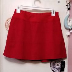 Drawstring Adjuster Inside Waistband Key Pocket Small Zipper Pocket Tiered Finish Skirt Over Shorts Combo Red Short Skort With Built-in Shorts, Red Stretch Skort Mini Length, Red Stretch Mini Skort, Red Stretch Mini Length Skort, Stretch Red Mini Bottoms, Red Stretch Mini Bottoms, Red Stretch Mini Length Bottoms, Red Stretch Mini-length Bottoms, Red Summer Skort With Built-in Shorts