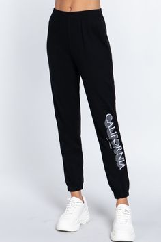 Imported S.M.L GRAPHIC LONG JOGGER PANTS 57% Cotton 38% Polyester 5% Cotton Black ACT Graphic Long Jogger Pants split Item Measurements: SIZE S Measurements: SIZE S Inseam:" Length:" Hips:" Rise: split split Sporty Graphic Print Joggers For Sports, Sporty Cotton Joggers With Graphic Print, Black Cotton Sportswear Joggers, Black Letter Print Sporty Joggers, Black Cotton Joggers With Logo Print, Knit Loungewear Set, Belted Mini Skirt, Plaid Poncho, 90's Fashion