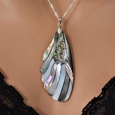 "♥ Ready to ship ♥ 100% handmade ♥ Packed in a gift box ♥ Length chain 16,18,20,22, or 24 inches (customer choice) ♥ Pendant size 5cm x 7cm The mother of pearl pendant necklace is a stylish, elegant, luxury accessory. Absolutely gorgeous, feminine & romantic, tasteful but eye-catching! Timeless, feminine, and graceful jewelry. Add a pair of matching earrings to create an elegant ensemble. This is a perfect necklace for many occasions and would be a fantastic present! All my items are beautifully Unique Teardrop Pendant Necklaces As Gift, Unique Teardrop Pendant Necklace As Gift, Unique Teardrop Mother Of Pearl Jewelry, Handmade Shell-shaped Necklace For Gift, Handmade Teardrop Mother Of Pearl Jewelry, Artisan Teardrop Jewelry For Gifts, Unique Drop Necklaces For Gifts, Unique Mother Of Pearl Jewelry Gift, Unique Mother Of Pearl Jewelry For Gifts