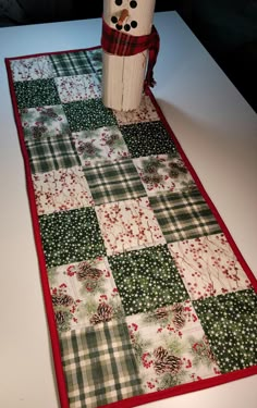 a table runner with a snowman on it