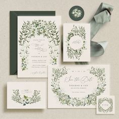 wedding stationery suite with greenery wreath and monogrammings on the front