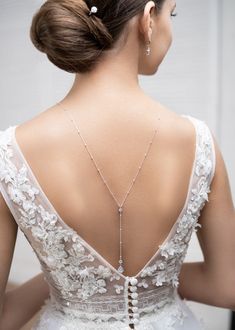 Bridal backdrop necklace made of a very fine sterling silver chain with cubic zirconia stones in settings. This is an over the head necklace without clasp. Can easily be worn as a sautoir after the wedding. To be worn with matching Victoria earrings and Josephine bracelet. - Length: It falls in the back at about 28cm from the base of the neck - 925 Sterling Silver chain Made in France - 7 day return or exchange Made to order: Any length possible, No extra cost. Returns accepted ! Please convo. ♥ Victoria collection https://www.etsy.com/fr/shop/Princessed1jour?ref=l2-shopheader-name&search_query=victoria ♥ Josephine collection https://www.etsy.com/fr/shop/Princessed1jour?ref=l2-shopheader-name&search_query=josephine ♥ All bridal backdrop necklaces https://www.etsy.com/fr/shop/Princessed1jou Elegant Cubic Zirconia Backdrop Necklace With Delicate Chain, Crystal Backdrop Necklace With Clavicle Chain For Wedding, Delicate Diamond Necklace With Adjustable Chain For Wedding, Crystal Clavicle Chain Backdrop Necklace For Wedding, Silver Body Chain With Clavicle Design For Wedding, Elegant Crystal Lariat Backdrop Necklace, Wedding Cubic Zirconia Diamond Necklace With Adjustable Chain, Silver Delicate Chain Body Chain For Wedding, Elegant Rhinestone Necklace With Adjustable Chain For Wedding