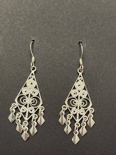 Delicate vintage sterling silver filigree earrings. So shiny and beautiful that they look like they are new. These are very lightweight and go with any outfit. The filigree work is exquisite and adds a touch of bling. Great for you or someone you love. Filigree Earrings, Sterling Silver Filigree, Vintage Heart, San Antonio Tx, Silver Filigree, Fringe Earrings, Earings Piercings, Vintage Earrings, Sterling Silber