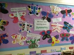 a bulletin board with butterflies on it