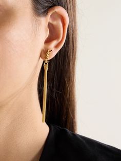 We could imagine SAINT LAURENT's earrings slotting anywhere within the label's decades-long archive. They're made from gold-tone metal with monogrammed studs and glamorously swaying chain tassels. Chain Tassel Earrings, Flat Dress Shoes, Eyewear Shop, Floral Dresses Short, Dress Flats, Earrings In Gold, Sunglasses Shop, Tassel Earrings, Gold Tone Metal