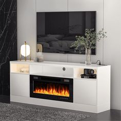 BREEZEHEAT Electric Fireplace TV Stand-70 inch TV Stand with 36" Electric Fireplace.This TV stand has a modern look, a fireplace insert, plus it holds TVs up to 80'' wide. The glossy front doors and the wood grain body create a luxurious and contemporary look. Make your home more enjoyable with this entertainment center!LED kit included muti changeable colors to customize space and atmosphere. The LED lights create a stunning effect that makes your accessories stand out. Size: M.  Color: Black. Modern Fireplace Tv Stand, Floating Wall Tv, Tv Cabinet With Storage, Mom Bedroom, 70 Inch Tv Stand, Electric Fireplace Living Room, Modern Electric Fireplace, Electric Fireplace Tv, Bedroom Tv Stand