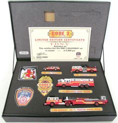 the fire department badges are in a black case