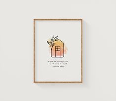 a framed print with an illustration of a house and tree on the wall above it