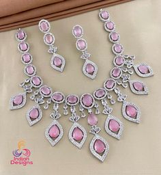 Baby Pink Silver AD necklace Earring set| American diamond necklace| Cz Diamond Indian Wedding jewelry|Bollywood Style Jewelry| Gift for her Pink Teardrop Crystal Jewelry, Pink Oval Cubic Zirconia Necklaces, Pink Oval Cubic Zirconia Necklace, Hand Set Pink Crystal Jewelry, Pink Crystal Jewelry With Hand Set Details, Pink Crystal Jewelry Hand Set, Pink Diamond Bridal Necklace Hand Set, Hand Set Pink Crystal Bridal Necklace, Pink Cubic Zirconia Bridal Necklace For Party