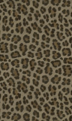 an animal print fabric with brown and black spots