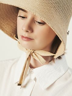 Editor's NotesELKE BLOEM's hat is lovely and perfect for daily wear.- Light-weighted- Eye-catching ribbon strap detail- Ideal sun shade for the face- Feminine and basic styleMeasurements(in.)- Size: One size.- Head Girth: 22.05in. ~ 23.62in.- Height: 5.12in.- Brim: 3.94in.Composition & Care- 65% Paper, 35% cotton- Avoid direct heat and moisture- Dry cleaning or hand wash is recommendedDesigner- by ELKE BLOEM Adjustable Pre-tied Spring Hat, Chic Cream Summer Hat Bands, Chic Hats With Uv Protection And Adjustable Fit, Chic Adjustable Hats With Uv Protection, Chic Adjustable Hat With Uv Protection, Spring Vacation Hats With Adjustable Strap, Adjustable Chic Bucket Hat For Spring, Chic Adjustable Bucket Hat For Spring, Chic Adjustable Wide Brim Bucket Hat