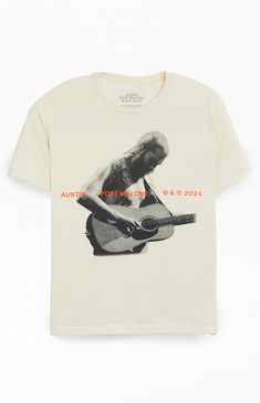 Amp up your closet game with the new Post Malone Guitar T-Shirt. With a classic crew neckline, short sleeves, and a regular fit, it's the ultimate expression of style and comfort. Plus, featuring iconic Post Malone graphics, because who doesn't love him?


	Crew neckline
	Short sleeves
	Standard fit
	Post Malone graphics
	100% Cotton
	Machine washable Band Logo Graphic Tee With Crew Neck, Graphic Tee With Band Logo And Crew Neck, Tri-blend T-shirt With Band Logo And Crew Neck, Tri-blend Crew Neck T-shirt With Band Logo, Concert T-shirt With Sublimation Print And Crew Neck, Crew Neck T-shirt With Sublimation Print For Concert, Casual Crew Neck T-shirt For Concert, Casual Band Logo T-shirt, Casual Short Sleeve T-shirt With Band Logo