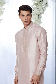 This rose gold silk kurta set features kiran dori embroidery on the collar, cuff and placket. It is paired with a jacquard trouser. Complimenting footwear is also available.From Seema Gujral's Tuscan Summer collection. DELIVERY TIMEPlease allow 8-12 weeks for your outfit to arrive.FABRIC DETAILSSilkProfessional cleaning only. Tuscan Summer, Dori Embroidery, Seema Gujral, Silk Kurta Set, Men Kurta, Silk Kurta, Gold Silk, 12 Weeks, Kurta Set