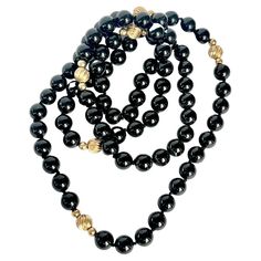 The onyx beads are beautifully glossy and the six 9carat gold beads compliment the beads perfectly. Length: 80cm Bead Diameter: 7mm Weight: 58.3g Gold Bead Necklace, Onyx Bead, Gold Beads, Onyx, Beaded Necklace, Jewelry Necklaces, Beads, Gold, Beauty