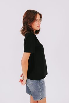 Introducing the Fine Tune Tee - your new go-to t-shirt for everyday comfort and style. With a classic crewneck and a convenient front chest pocket, this tee has all the features you need to fine tune your wardrobe. Perfect for any casual occasion. Details Crewneck Front chest pocket Sizing Approximate measurements: SIZE LENGTH BUST Small 24"﻿ 38"﻿ Medium 24.5"﻿ 40"﻿ Large 25"﻿ 42"﻿ Fabric has stretchModel is 5’8 wearing small Material 50% Bamboo 42% Modal 8% SpandexHand wash coldHang or lay flat Chest Pocket, Lay Flat, Crew Neck, Wardrobe, Fabric, T Shirt, How To Wear, Black