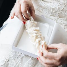 The one and only! Detailed with a peek-a-boo bow in the back for only the most classic of brides and delicate ivory, pearl-like beads throughout the design, this wedding heirloom is timeless in every way. Our 'Aisle Always Love You' style wedding garter is the perfect heirloom to meet your match at the end of the aisle. Details Production Shipping Sizing Main Garter: Light ivory satin background with a stripe of ivory pearl-like beaded trim with an oversized ivory satin bow with short tails tied Elegant Adjustable Bridal Accessories For Marriage, Elegant Adjustable Bridal Accessories, Adjustable Pearl Bridal Accessories For Wedding, Elegant Bridal Belt With Satin Bow For Wedding, Elegant Adjustable Bridal Accessories For Wedding, Elegant Lace Bridal Accessories For Bridal Shower, Adjustable Bridal Accessories For Ceremony, Elegant Satin Bridal Accessories For Wedding, Pearl White Bridal Accessories For Wedding